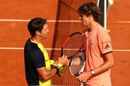 Dusan Lajovic and Alexander Zverev after their match at the 2018 French Open